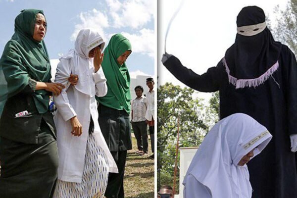 Hukuman berdasarkan hukum syariah - pelaku perzinahan dicambuk di depan umum di Indonesia